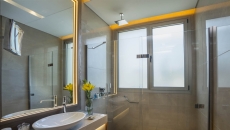 Shower Doors and Mirrors located in Two Bedroom Residence